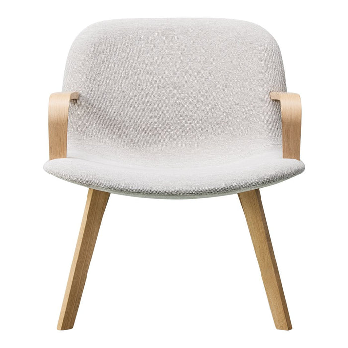 Light gray upholstered chair with minimalist design and natural wood legs, featuring smooth, soft textures.