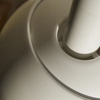 Close-up of a white ceiling fan blade