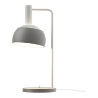 Modern table lamp with gray shade and white base on a white background