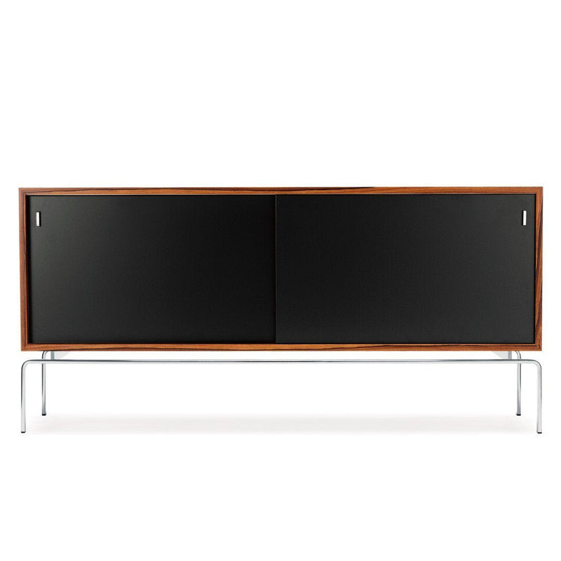 Mid-century modern cabinet in rich brown wood with sleek black doors and minimalist chrome legs, perfect for stylish storage.