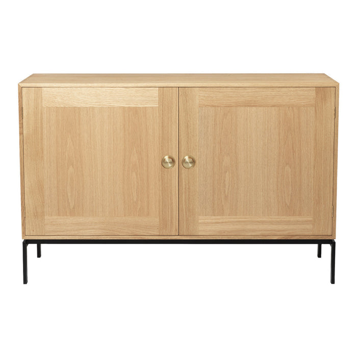 Light natural wood cabinet with smooth grain, featuring black metal legs and gold knobs. Minimalist design.