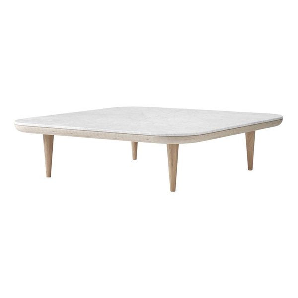 Square coffee table featuring a light wood finish and a smooth white top, highlighting a minimalist design.