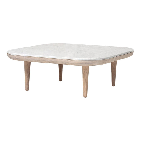 Light beige tabletop with a smooth finish and natural wood legs, featuring a minimalist design.