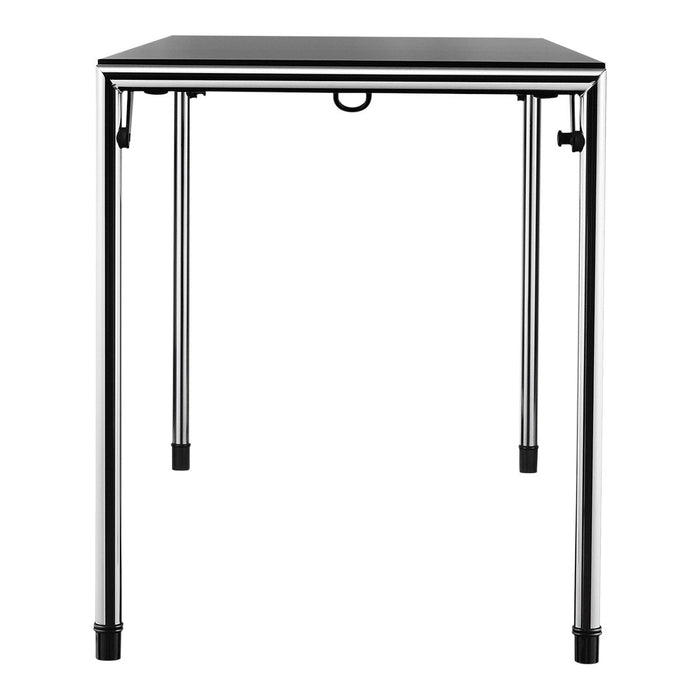Black tabletop with sleek chrome legs, featuring a minimalistic design. Perfect for modern decor.