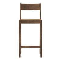 Wooden bar stool in rich brown with a smooth, minimalist design. Perfect for modern or rustic decor.
