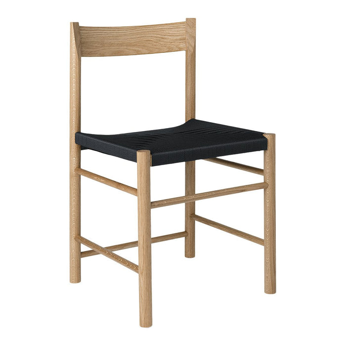 Natural wood frame with a minimalist design, featuring a solid black cushion seat for a modern touch.