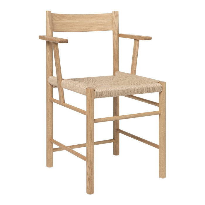 Natural wood chair with a light finish and woven beige seat, offering a minimalist, contemporary design.