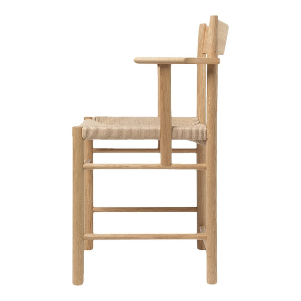 Natural wood bar stool with a light beige woven seat and minimalist design.