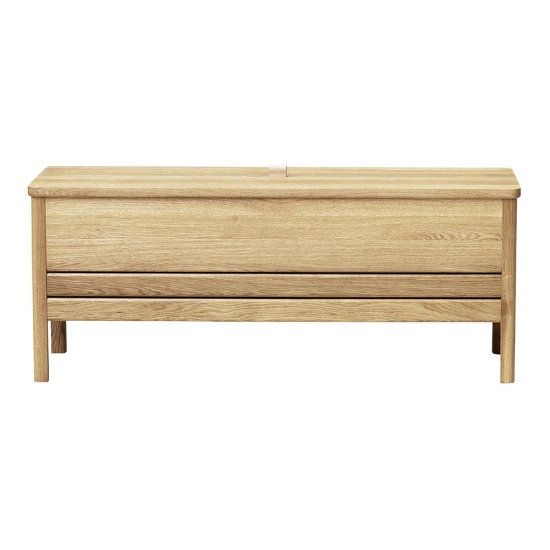 Light oak wood storage bench with natural grain and smooth finish, featuring two horizontal drawers.