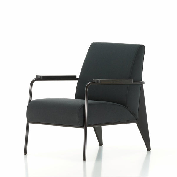 Sleek black armchair with a minimalist design and smooth fabric, featuring a modern metal frame. Perfect for contemporary decor.