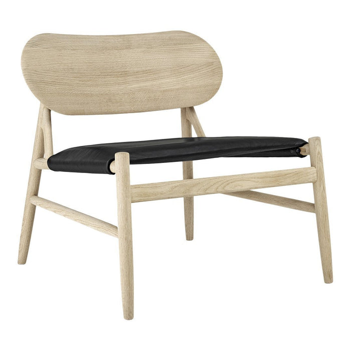 Natural wood frame with a smooth light finish and a sleek black leather cushion on a minimalist chair design.