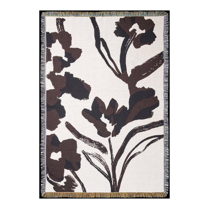 Floral-patterned rug with bold brown designs on a cream background, featuring fringed edges for added texture.