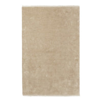 Soft beige area rug with a subtle texture and no visible patterns, perfect for versatile home styling.