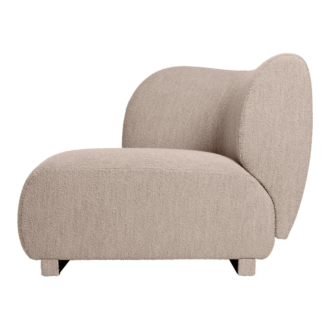 Textured beige curved chair with soft fabric, featuring a minimalist design and warm, neutral tones.