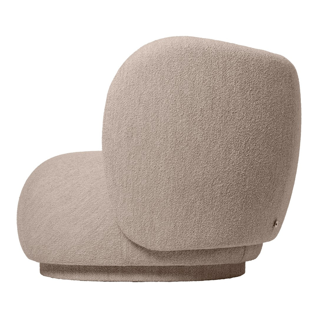 Beige, textured upholstery with a soft, cozy finish, featuring a round, curvy design ideal for modern interiors.