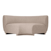Beige curved sofa with a textured, plush fabric for a cozy, modern look. Perfect for any stylish living space.
