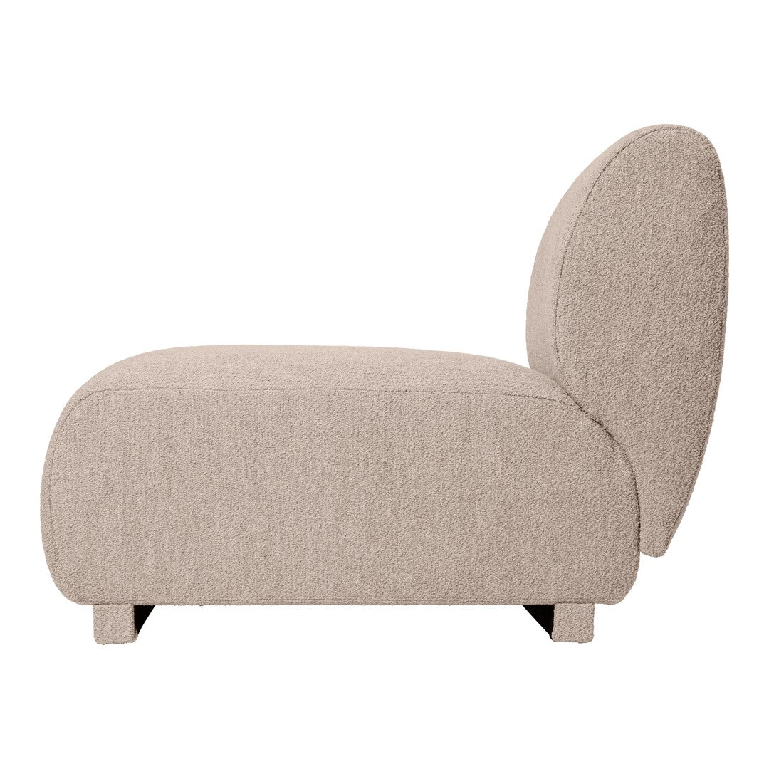 Beige textured lounge chair with a modern, rounded design, featuring soft, neutral hues.