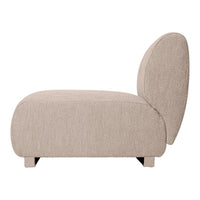 Beige textured lounge chair with a modern, rounded design, featuring soft, neutral hues.