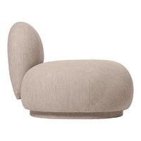 Beige upholstered chair with a rounded back, featuring a soft texture and minimalist design. Perfect for modern interiors.