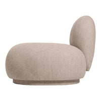 Beige textured lounge chair with soft curves and a cozy, tactile finish. Perfect for modern decor.