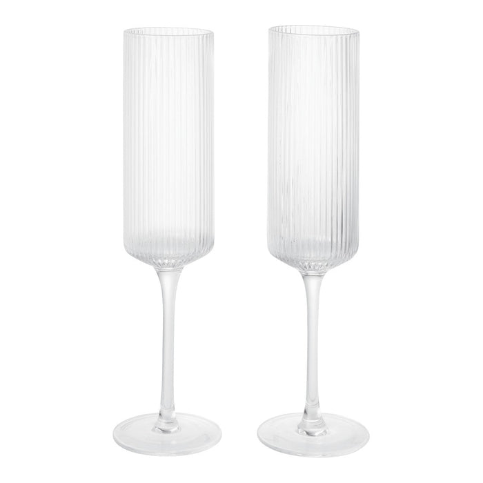 Clear ribbed glass champagne flutes with elegant tall stems, perfect for special occasions and celebrations.