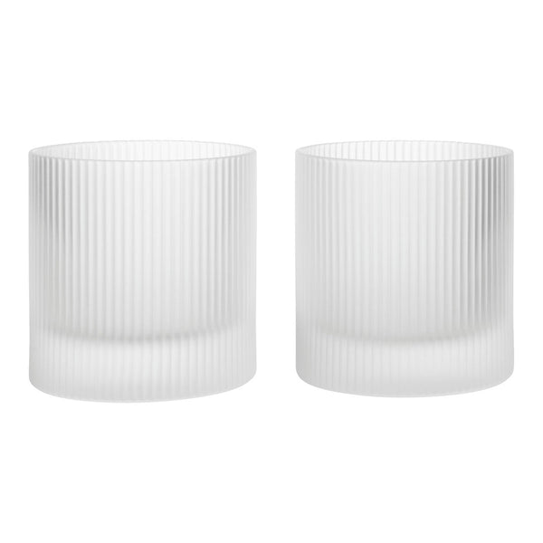 Pair of clear glass candle holders with textured ribbed pattern, featuring a sleek and modern design.