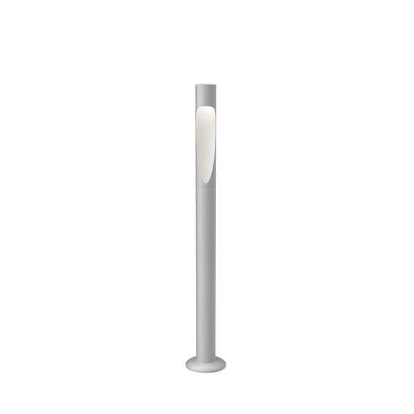 Sleek silver floor lamp with a modern design, featuring a smooth white light panel for a contemporary look.