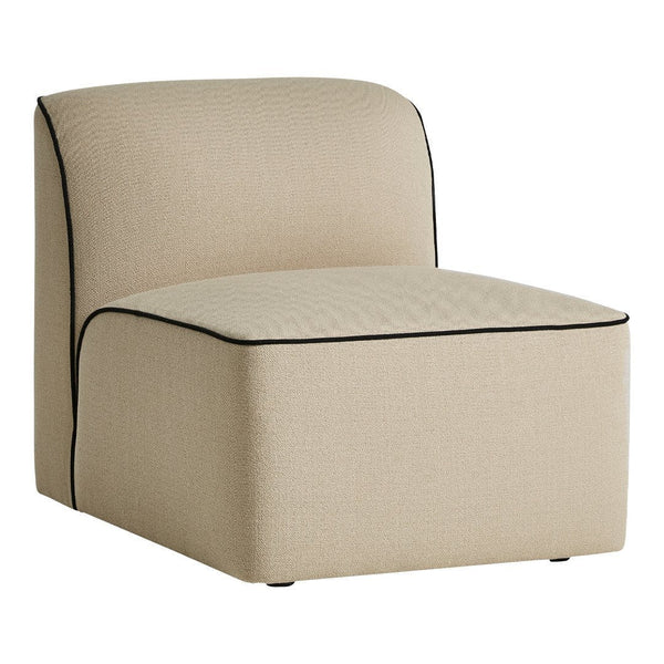Beige upholstered chair with contrasting black piping and a simple, modern design. Perfect for stylish decor.