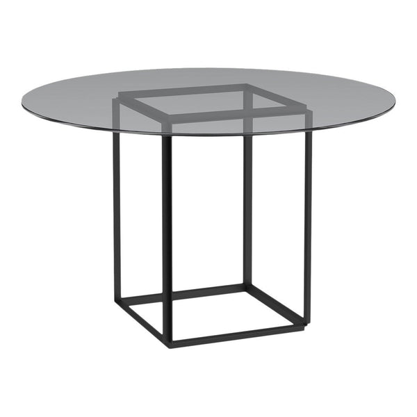 Round glass tabletop with a sleek black geometric base, showcasing modern style and minimalistic design.