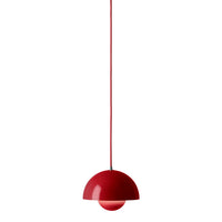 Red pendant lamp with a sleek, modern half-dome shape and glossy finish, featuring a matching red cord.