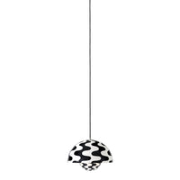Black and white pendant lamp with wavy pattern on a sleek design, perfect for modern decor.