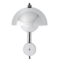 Sleek silver wall lamp with a glossy white dome shade and minimalistic chrome accents.
