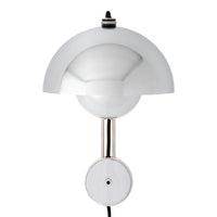 Sleek white dome lamp with a glossy finish and modern metallic accents, perfect for contemporary decor.