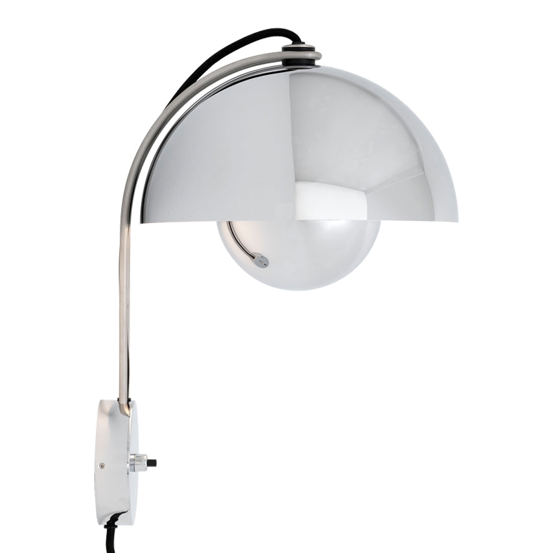 Chrome arch lamp with a sleek, metallic finish and a glossy white sphere, exhibiting a modern minimalist design.