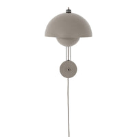 Modern wall lamp in soft gray with a curved shade and simple round base, featuring a clean design and smooth lines.