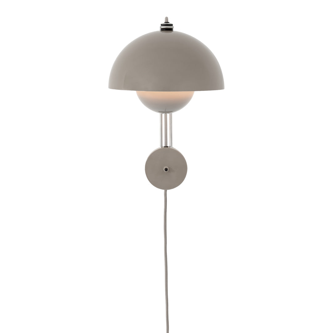 Modern wall lamp with a sleek gray dome shade and minimalist design, featuring smooth, soft curves and clean lines.