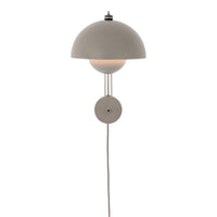 Modern wall lamp with a sleek gray dome shade and minimalist design, featuring smooth, soft curves and clean lines.