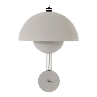 Gray dome lamp with smooth, minimalist design and glossy chrome accents. Elegant and modern home decor piece.