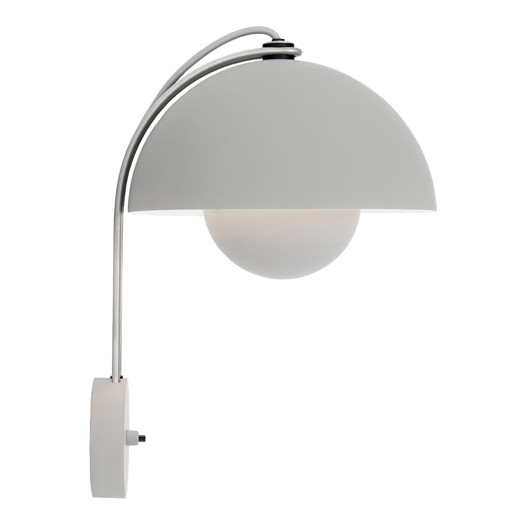 Sleek white lamp with a curved chrome arm and a round frosted glass globe, featuring a minimalist design.