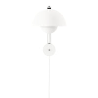 White dome-shaped lamp with sleek clear and black accents, featuring a minimalist design perfect for modern decor.