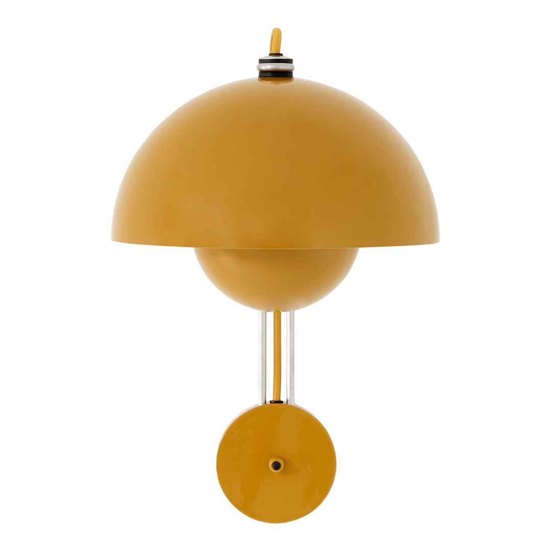 Yellow dome-shaped lamp with a smooth finish and sleek metallic accents, designed for a modern aesthetic.