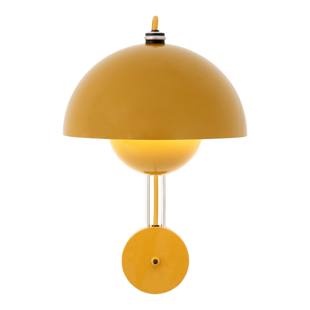 Yellow dome pendant lamp with a glossy finish and circular base, creating a modern and sleek design.