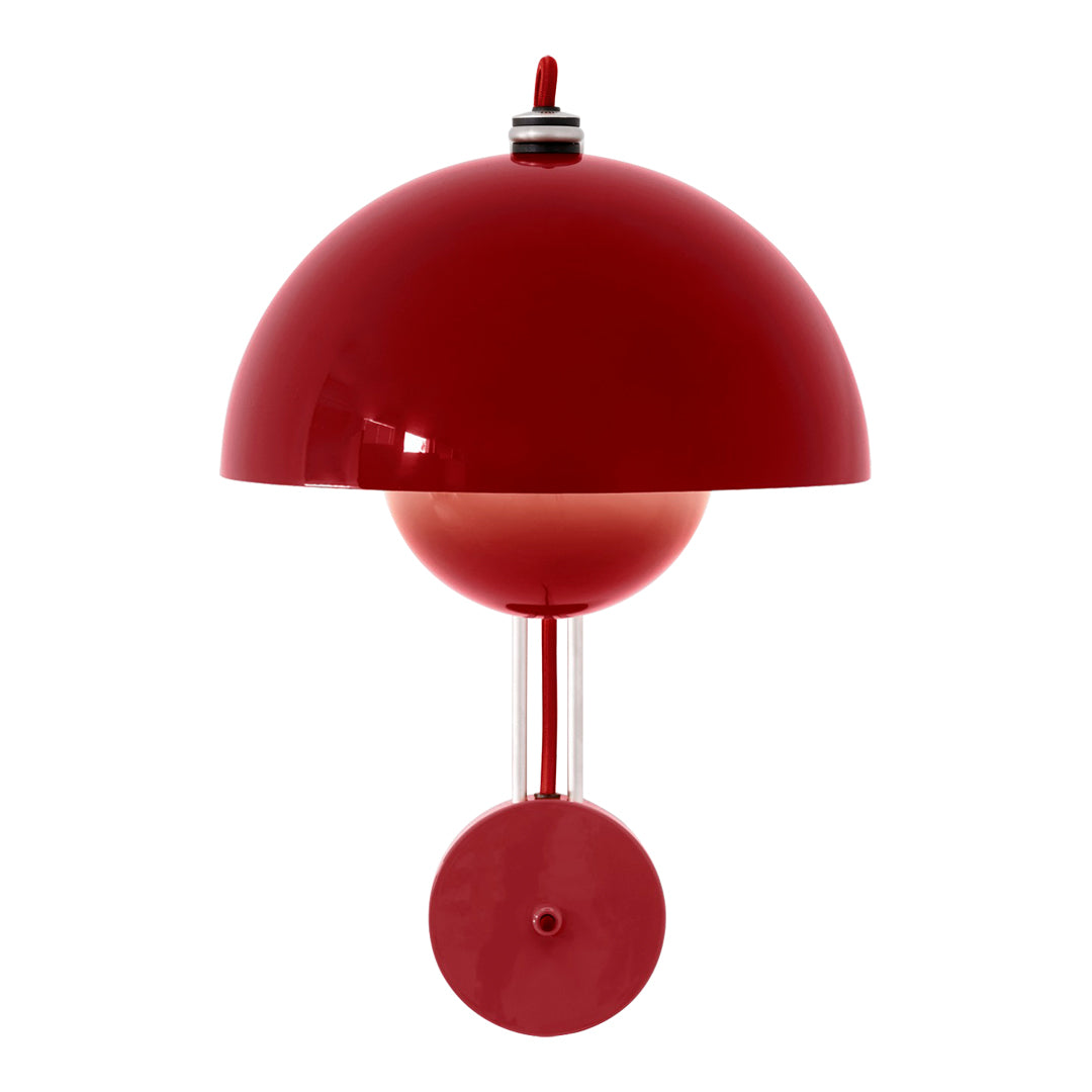 Red modern lamp with a glossy finish and a unique semi-circular design. Perfect for stylish lighting accents.
