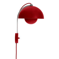 Red dome wall lamp with a glossy finish and sleek chrome accents, featuring a round light bulb design.