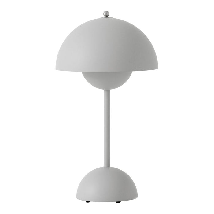 Modern white lamp with a smooth, rounded design and matte finish, featuring a simple and elegant color palette.