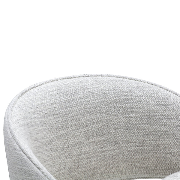 Light gray upholstered chair with a smooth, textured finish, featuring a subtle woven pattern.