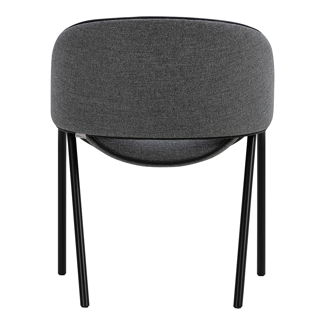 Gray upholstered chair with a smooth rounded back and black metal legs, perfect for modern interiors.
