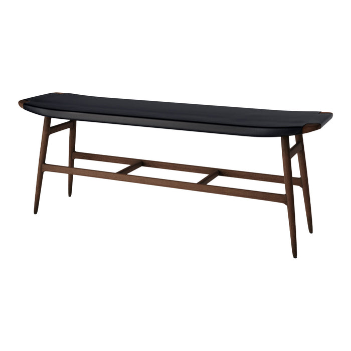 Black upholstered bench with a sleek, curved top and rich walnut wood legs, featuring a minimalist design.