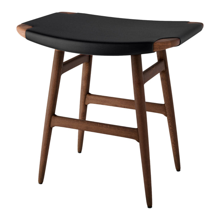 Black leather seat with smooth curves and natural wood legs, showcasing a stylish modern design.