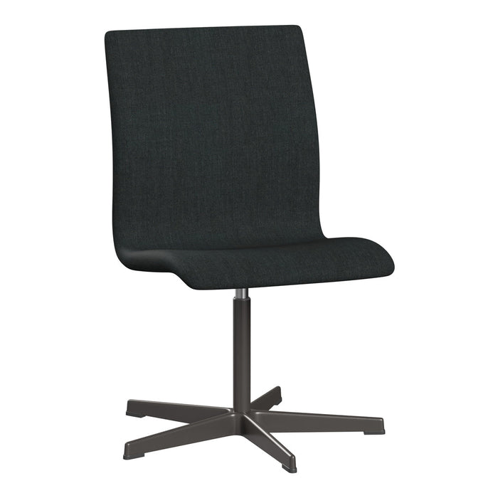 Modern black upholstered chair with a sleek silhouette and subtle texture, featuring a matte black metal base.